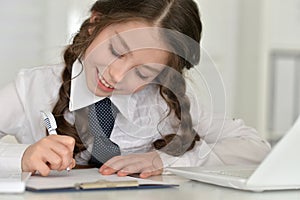 Cute girl doing homework