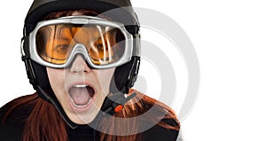 Cute girl with snowboarding helmet and goggles