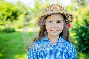 Cute girl straw hat rustic style nature background, summer at countryside