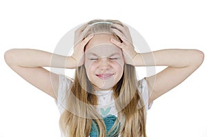 Cute girl suffering from headache. Isolated on white background.