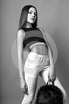 Cute girl teenage with long hair posing studio nature portrait. Black and white