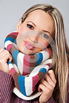 Cute girl in warm scarf