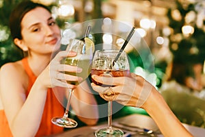 Cute Girls Celebrating Night Out With Cocktail Drinks