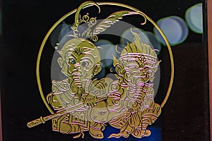 Cute glass ornament with gold filigree of young Sun Wukong, the