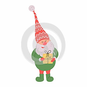 Cute gnome in santa hat on white background. Scandinavian christmas elve photo