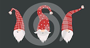 Cute gnomes faces in santa hats on black background. Scandinavian christmas elves. Vector illustration in flat cartoon