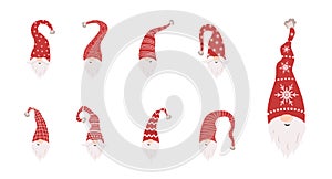 Cute gnomes faces in santa hats on white background. Scandinavian christmas elves. Vector illustration in flat cartoon