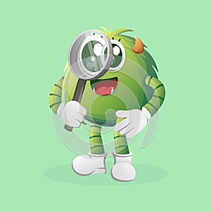 Cute green monster conducting research, holding a magnifying glass