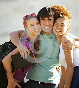 Cute group of teenages at the building of