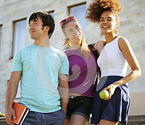 Cute group of teenages at the building of