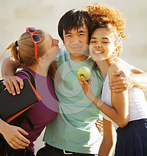 Cute group of teenages at the building of