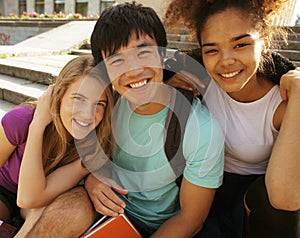 Cute group of teenages at the building of