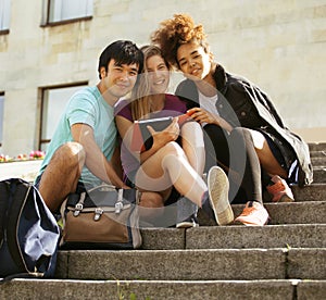 Cute group of teenages at the building of