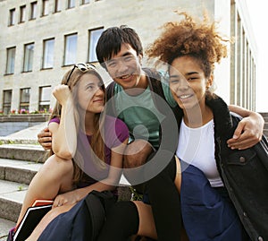 Cute group of teenages at the building of