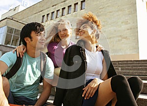 Cute group of teenages at the building of