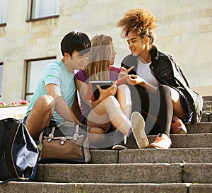 Cute group of teenages at the building of