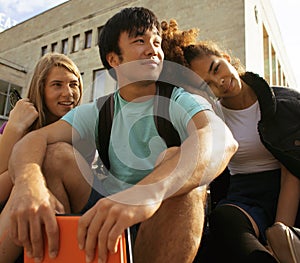 Cute group of teenages at the building of