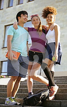 Cute group of teenages at the building of