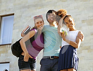 Cute group of teenages at the building of