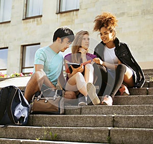 Cute group of teenages at the building of