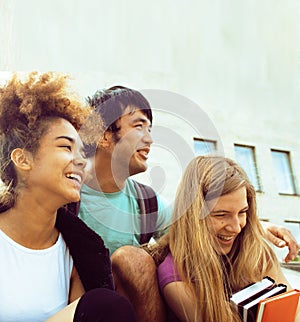 Cute group teenages at the building of university