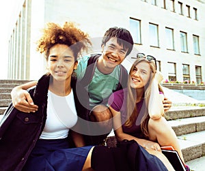 Cute group teenages at the building of university