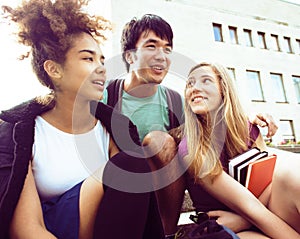 Cute group teenages at the building of university