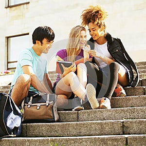 Cute group teenages at the building of university