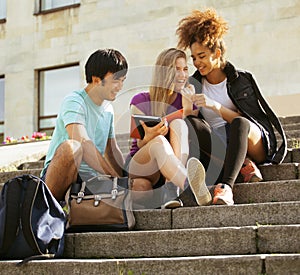 Cute group teenages at the building of university