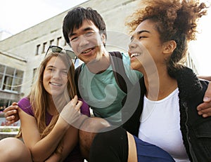 Cute group teenages at the building of university