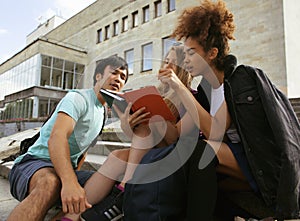 Cute group teenages at the building of university