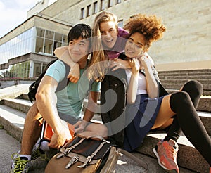 Cute group teenages at the building of university
