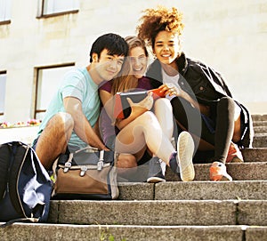 Cute group teenages at the building of university