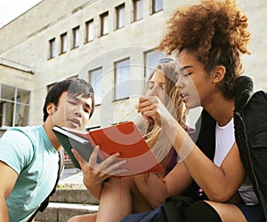 Cute group teenages at the building of university