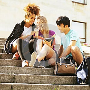 Cute group teenages at the building of university