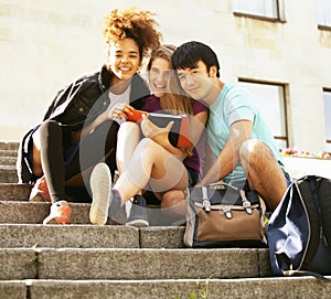 Cute group teenages at the building of university