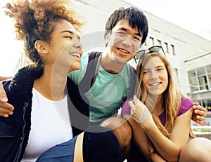 Cute group teenages at the building of university