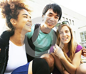 Cute group teenages at the building of university