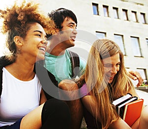 Cute group teenages at the building of university