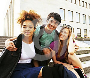 Cute group teenages at the building of university