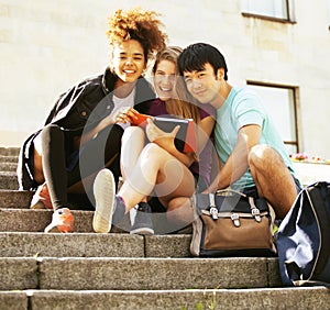 Cute group teenages at the building of university