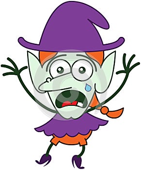 Cute Halloween witch crying and feeling scared