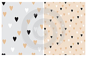Cute Hand Drawn Irregular Hearts Vector Patterns. White, Black and Beige Hearts.