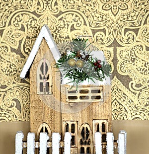 Cute handmade wooden house in winter, christmas decoration