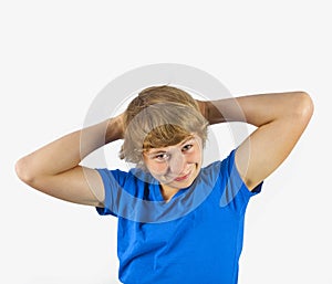 Cute handsome boy poses in studio