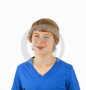 Cute handsome boy poses in studio