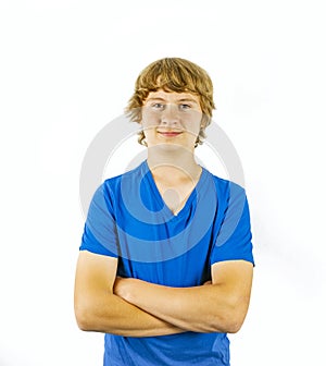 Cute handsome boy poses in studio