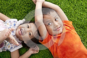 Cute happy asian siblings