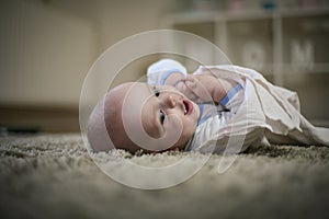 Cute happy baby boy portrait. Close up.