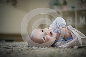 Cute happy baby boy portrait. Close up.